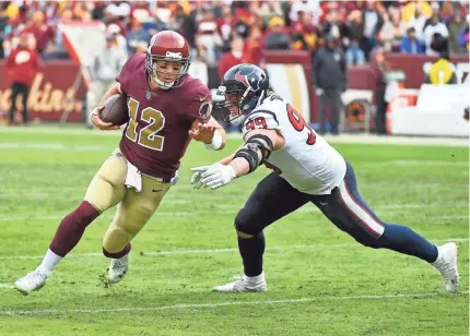  ?? BRAD MILLS/USA TODAY SPORTS ?? Colt McCoy, avoiding Texans standout defensive end J.J. Watt, has made 25 starts in his eight-year NFL career.