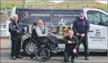  ??  ?? Many Kintyre companies, including Springbank Distillery, have sponsored the challenge. From left: David MacPherson senior, David MacPherson junior, Grant MacPherson of Springbank Distillery and JAPES founder Nelson Liddle.