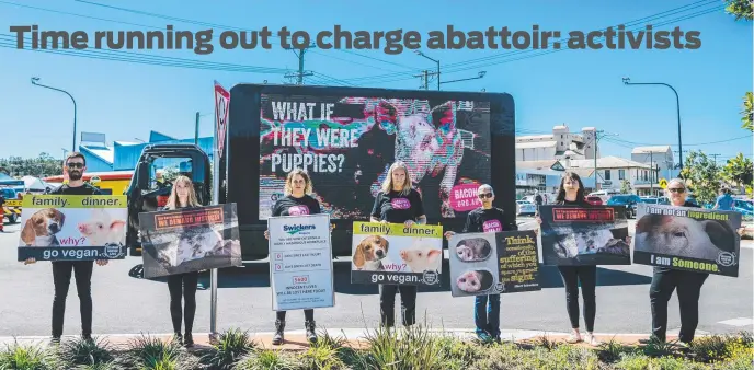  ?? Picture: Supplied ?? Animal Liberation Queensland activists protesting at the 2022 Kingaroy BaconFest.