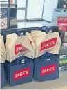  ??  ?? Top: Tesco chief executive Dave Lewis in a new Jack’s discount store. Above: Jack’s will take on discount chains.