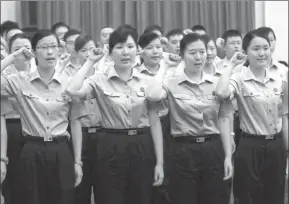  ?? PROVIDED TO CHINA DAILY ?? Newly appointed judge assistants take their oath as they assume their posts in Shanghai.