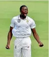  ??  ?? Kagiso Rabada of South Africa celebrates the wicket of Steve Smith during the second test.