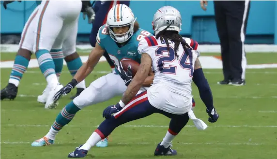  ?? AP PHOTOs ?? OUT: Patriots cornerback Stephon Gilmore will miss the last two games of the season after suffering a torn quad muscle against the Dolphins on Sunday. Meanwhile, punter Jake Bailey, below, was named to his first Pro Bowl on Monday.