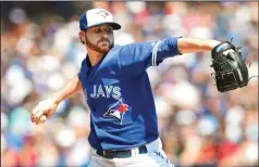 ?? CP PHOTO FRED THORNHILL ?? Toronto Blue Jays starting pitcher Drew Hutchison throws against the New York Yankees during first inning American League MLB baseball game in Toronto on Sunday.