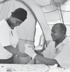  ??  ?? A woman takes an HIV test in this fifile photo