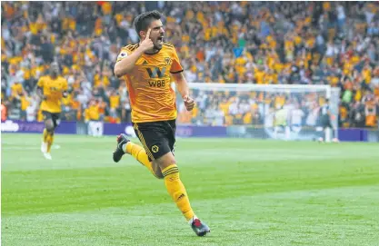  ??  ?? Wolverhamp­ton’s Ruben Neves celebrates after scoring against Everton.