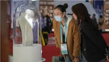  ?? Photo chinadaily.com.cn ?? Visitors check the booth of Kering Group during the sixth China Internatio­nal Import Expo in Shanghai. A surprise warning from Kering last month that first quarter sales would be down by 10 per cent rather than 3 per cent expected by analysts has already cast a cloud over the reporting season.