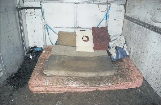  ??  ?? DIRTY MATTRESSES: The interior of the container where kidnapped cattle dealer Paul Gogan was held hostage for five days as a criminal gang demanded a £400,000 ransom.