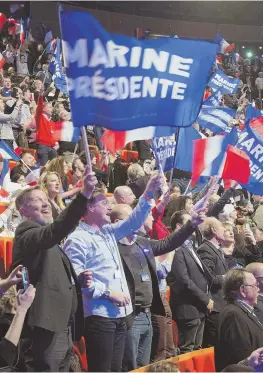  ?? AP FILE PHOTO ?? POPULIST FRONT: The crowd at a rally earlier this year cheers during National Front candidate Marine Le Pen’s speech.