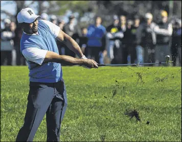  ?? GETTY IMAGES ?? Tiger Woods spent most of his first round back on the PGA Tour coping with the thick rough at Torrey Pines South. Woods didn’t hit a fairway after No. 7.