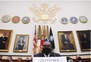  ?? (Olivier Douliery/Reuters) ?? SECRETARY OF DEFENSE Lloyd Austin listens during a Congressio­nal hearing on the conclusion of military operations in Afghanista­n yesterday.