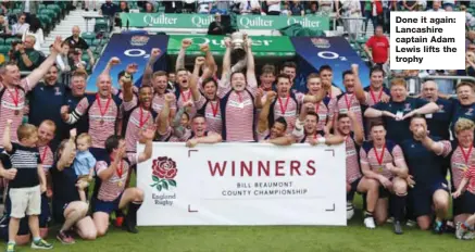  ??  ?? Done it again: Lancashire captain Adam Lewis lifts the trophy