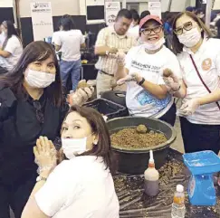  ??  ?? Lizzy Razon, Joy Wassmer and Gina Godinez are manning the Solaire area, creating the Mabuhay Balls.