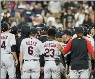  ?? NAM Y. HUH — THE ASSOCIATED PRESS ?? White Sox and Indians gather after White Sox’s Jose Abreu was hit by a pitch thrown by ndians reliever James Karinchak during the eighth inning of a baseball game in Chicago, July 30. The Chicago White Sox won 6-4.