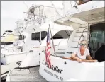  ?? Peter Hvizdak / Hearst Connecticu­t Media ?? An Orange woman sits on her 46-foot boat at Bruce & Johnson Marina in Branford.