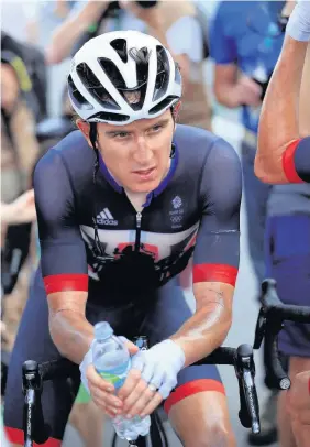  ??  ?? A devastated Geraint Thomas after crossing the finishing line