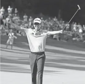  ??  ?? Michael Kim reacts to winning the John Deere Classic at TPC Deere Run on Sunday. BRIAN SPURLOCK/USA TODAY SPORTS