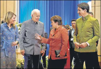  ?? ?? Flanked by Canada’s PM Justin Trudeau (right) and foreign minister Melanie Joly (left), US President Joe Biden speaks with Internatio­nal Monetary Fund managing director Kristalina Georgieva (second right) at the Asean gala dinner, in Phnom Penh, Cambodia, on Saturday.