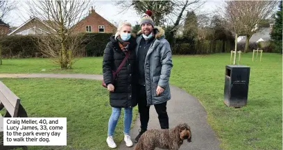  ??  ?? Craig Meller, 40, and Lucy James, 33, come to the park every day to walk their dog.