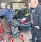  ?? ?? Fellow Rover 200 BRM enthusiast Paul Thompson and Glenn discuss the life and history of the replacemen­t engine.