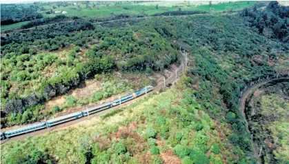  ?? Photo /NZME ?? The Overlander takes on the famous Raurimu Spiral. This summer, KiwirRail has pulled the plug on the Summer Programme Raurimu Spiral train trip.