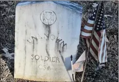  ?? Special to the Democrat-Gazette/MARCIA SCHNEDLER ?? At Camp Nelson Confederat­e Cemetery near Cabot, a tombstone is marked by an American flag and a smaller Confederat­e flag.