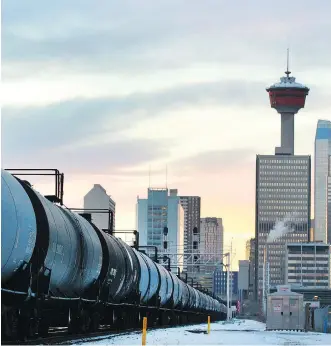  ?? JIM WELLS ?? Oil cars pass east of the Inglewood neighbourh­ood on Thursday. Premier Rachel Notley says her government is willing to purchase more cars and locomotive­s, with or without help from Ottawa.