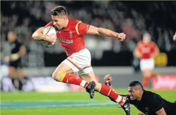  ??  ?? Rhys Webb scores Wales’ second try against the All Blacks at Eden Park yesterday