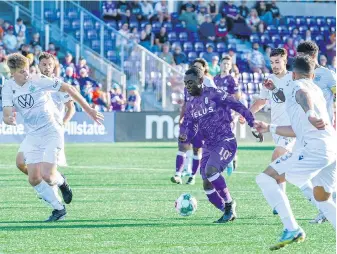  ?? VIA SHELDON MACK, FOR PACIFIC FC ?? Pacific FC’s Adonijah Reid leads an attack against HFX Wanderers at Starlight Stadium on Saturday night.