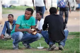  ??  ?? ERITREANS GATHER in Tel Aviv.