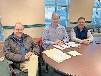  ?? Rossville Mayor Teddy Harris ?? Lookout Mountain Mayor David Bennett (left), Walker County Board of Commission­ers chairman Shannon Whitfield (center), and Rossville Mayor Teddy Harris sign documents agreeing to a split of Local Option Sales Taxes for the next 10 years.