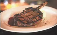  ??  ?? Bone-in ribeye will be on the menu at Johnny’s Italian Steakhouse in the Easton area.