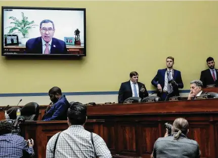  ?? Drew Angerer/Getty Images ?? Ruger CEO Christophe­r Killoy testifies virtually during a House Oversight Committee hearing titled Examining the Practices and Profits of Gun Manufactur­ers in the Rayburn House Office Building in Washington July 27.