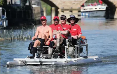  ?? Jonathan Brady ?? Alex Gibson, left, leads his team of Challengin­g MND fellow hydro-pedallers, second left to right, Andy Long, Joe Reed and Alun Thomas, as they travel along the River Thames at Newbridge, Oxfordshir­e