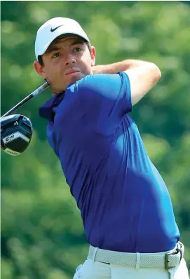  ?? GETTY IMAGES ?? Rory McIlroy plays his shot from the eighth tee during his final round at the Bridgeston­e Invitation­al