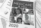 ?? WAYNE PARTLOW/AP FILE ?? Signing up for Medicare is time-sensitive; it usually happens around age 65. Initial enrollment is birthday-specific.