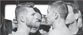  ?? JOE CAMPOREALE/USA TODAY ?? Middleweig­hts Canelo Alvarez, left, and Gennady Golovkin faced off last year in Las Vegas. The two return for the rematch Saturday.
