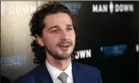  ?? The Associated Press ?? APOLOGIES: Shia LaBeouf arrives at the Los Angeles premiere of “Man Down” at ArcLight Cinemas Hollywood on Nov. 30, 2016. LaBeouf has apologized for a racist tirade against officers who arrested him for public drunkennes­s over the weekend in Savannah,...