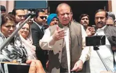  ?? Reuters ?? Pakistan’s former prime minister Nawaz Sharif talks to media after appearing before the accountabi­lity court in Islamabad in April. Sharif returned to the court yesterday.