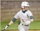  ?? STAFF PHOTO BY ROBIN RUDD ?? Silverdale Baptist's Brett Rogers (6) follows through on a hit in 2021. Rogers is a returning all-state player and one of the area's top overall athletes.