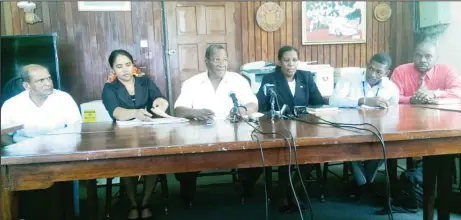  ??  ?? GPSU Vice-President Mortimer Livan (third from left), along with other GPSU members at yesterday’s press conference at GPSU’s headquarte­rs on Regent Street