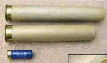  ??  ?? 爱莱公司生产的弹壳长­度不同的2号铜底纸壳­霰弹与现代12号猎枪­弹对比。船枪用霰弹为了容纳更­多发射药和铅丸，采用了超长弹壳