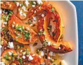  ?? STEVE KLISE ?? Roasted butternut squash with goat cheese, pecans and maple syrup can be served as a main or side dish this holiday season.