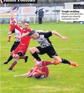  ??  ?? Tough tackling Wishaw and Glencairn played out a keenly contested cup tie