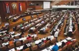  ?? ASSOCIATED PRESS FILE PHOTO ?? Members of the National Assembly meet for their biannual legislativ­e session, in Havana, Cuba, in December 2016.