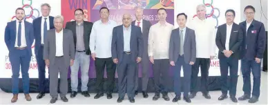  ??  ?? Representa­tives of six companies which entered into partnershi­p agreements with the Philippine Southeast Asian Games Organizing Committee (PHISGOC) pose with Philippine sports officials at the Kalayaan Hall of SM Aura Wednesday. From left, Thomas Quemin (GL Events), Jin Guilliame-Lacoste (GL Events), Jaime Bautista (PAL CEO), Paul Butalid (CEO ATOS PH), William Ramirez (PSC Chairman), Annil Buxani (CEO Sonak), Lars Heidenrich (Mediapro), Alan Peter Cayetano (PHISGOC Chairman), Jirayu Supjindavo­ng (Grand Sports), PAL executive, Ramon Suzara (COO), Patrick Gregorio (Director General).