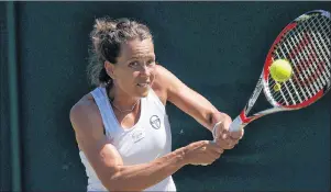  ?? AP PHOTO ?? Czech Republic’s Barbora Strycova returns to Japan’s Naomi Osaka during the women’s singles match on day three at the Wimbledon Tennis Championsh­ips in London, July 5, 2017. Strycova upset No. 13 Kristina Mladenovic 6-2, 6-3 at the Rogers Cup on Monday.