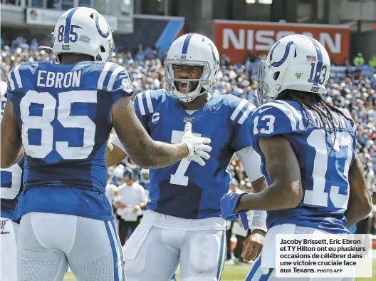  ?? PHOTO AFP ?? Jacoby Brissett, Eric Ebron et TY Hilton ont eu plusieurs occasions de célébrer dans une victoire cruciale face aux Texans.