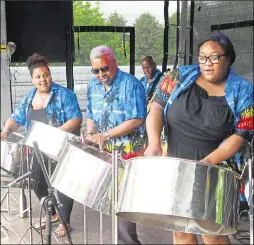  ?? 13797125 ?? The Phase Five Steel Band brought the laid-back sounds of the Caribbean to the County Town