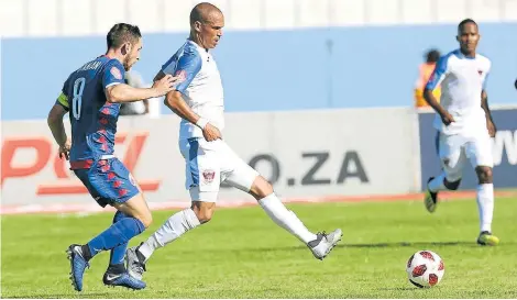  ?? Picture: MICHAEL PINYANA ?? ON THE PROWL: Ruzaigh Gamildien, of Chippa United, is marked by Dean Furman, left, of SuperSport United during their league game in Mdantsane